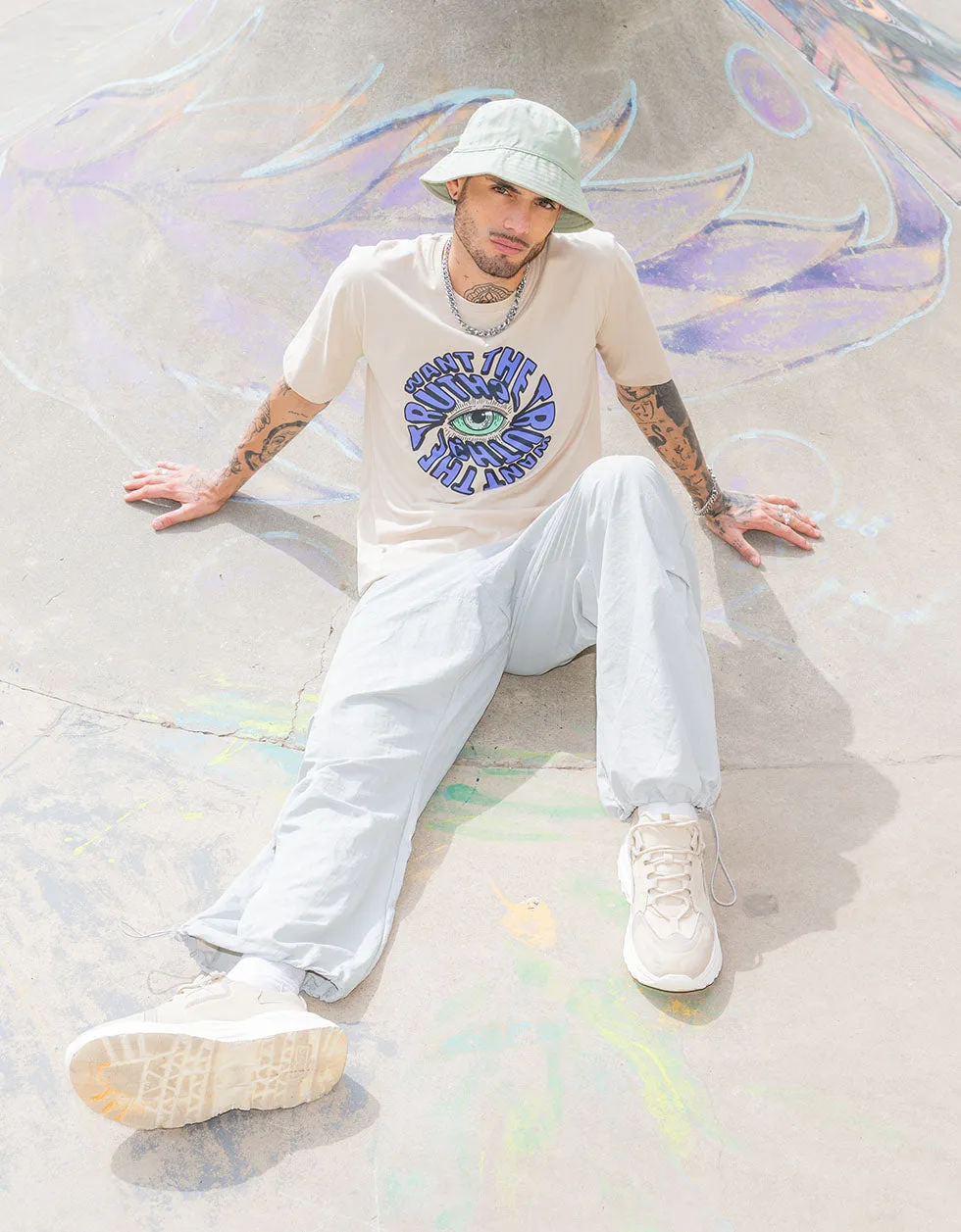 Truth Beige Oversized Chest Graphic Printed Tshirt