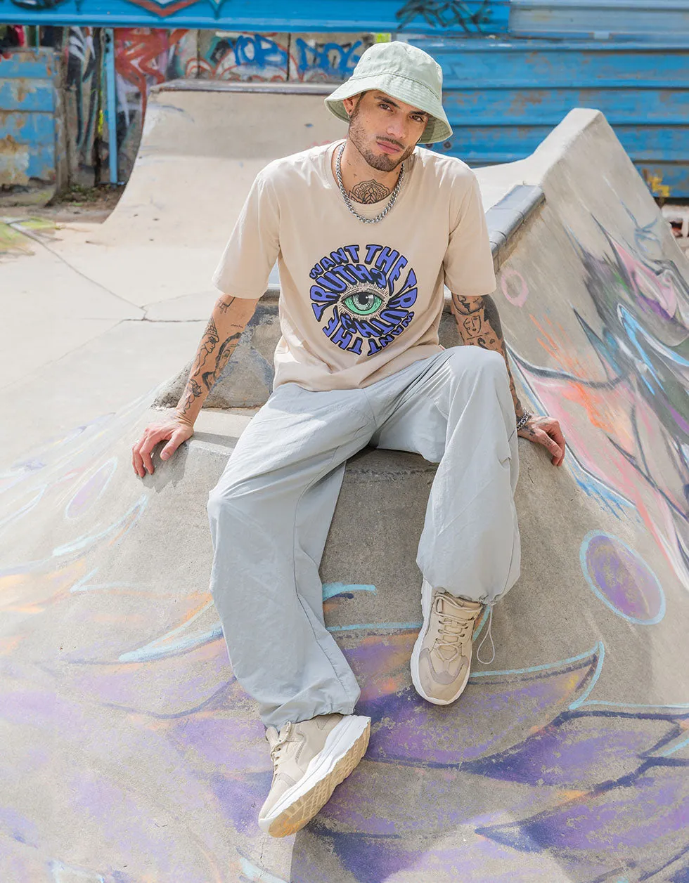 Truth Beige Oversized Chest Graphic Printed Tshirt